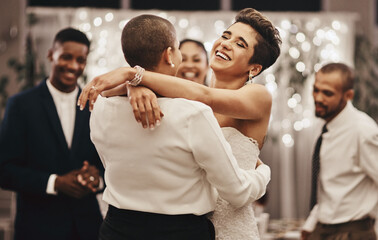 Wedding, diversity and dance with a lesbian couple in celebration of their union together at a...