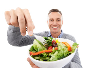 Healthy salad, food and vegetable with a man in studio for health, wellness and nutrition. Model person with green vegan lunch or brunch bowl in hands isolated on a white background for strong immune