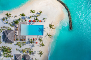 Aerial photo of beautiful Maldives paradise tropical beach. Amazing view, blue turquoise lagoon...