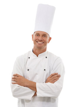 Chef, portrait and man with confident smile, cafe owner and small business leader in restaurant industry. Isolated on white background, happy executive French cook in uniform, arms crossed in studio.