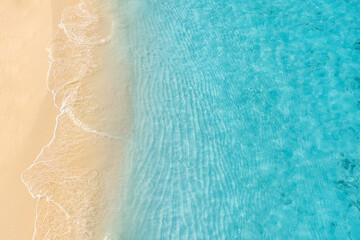 Summer seascape beautiful waves, blue sea water in sunny day. Top view from drone. Sea aerial view,...
