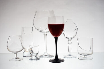 A glass of wine and broken glasses. Stop alcohol symbol.