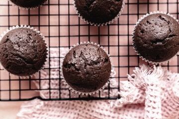 chocolate cake with chocolate muffin cupcake with butter cream and syrup and whipped cream