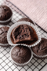 chocolate cake with chocolate muffin cupcake with butter cream and syrup and whipped cream