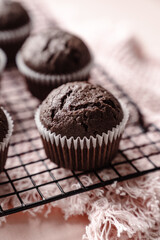 chocolate cake with chocolate muffin cupcake with butter cream and syrup and whipped cream