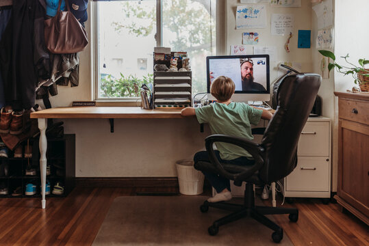 Wide view of young student learning from teacher by remote education - Powered by Adobe