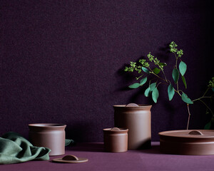 Still life with pottery jars, fabric, branch