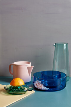 Still life of colored glass serving items