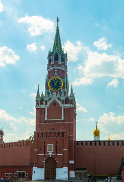 Saviour Tower ( , Spasskaya Bashnya) in Moscow, Russia is the main tower on the eastern wall of the Moscow Kremlin, overlooking the Red Square. Sunny day, blue sky with few white clouds.