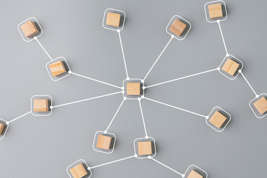 wooden cube block arrange for management thinking diagram on grey background. business process and workflow system concept.