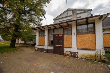 An old school in an abandoned manor house in central Poland, Europe in autumn