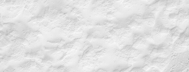 Obraz premium White rough stone wall texture background
