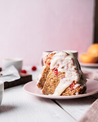 Two pieces of cherry bundt cake with chocolate icing