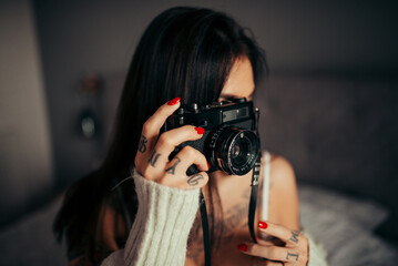 Hipster woman photograph portait closeup.