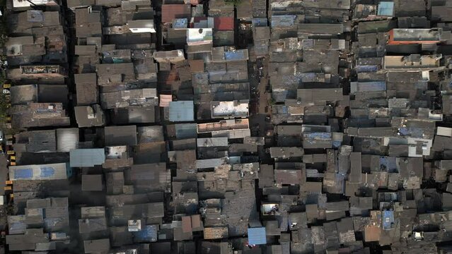 Top down aerial view of Dharavi slums in Mumbai, Maharashtra, India. Dharavi is considered to be one of the largest slums in the world and the largest in Asia.	