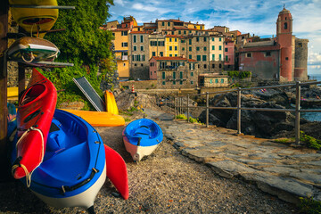 Colorful kayaks on the storage racks in Tellaro, Liguria, Italy