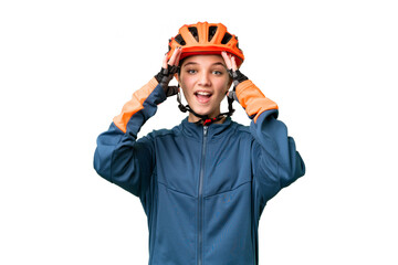 Teenager cyclist girl over isolated chroma key background with surprise expression - obrazy, fototapety, plakaty