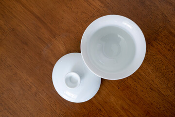 White teacups were isolated on the dining table