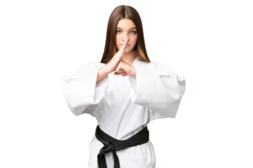 Foto op Plexiglas Teenager girl over isolated chroma key background doing karate and saluting © luismolinero