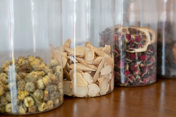 Close-up of dried astragalus and chrysanthemum.