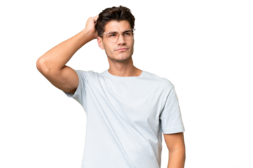 Young caucasian handsome man over isolated background having doubts while scratching head