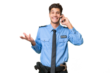 Young police man over isolated background keeping a conversation with the mobile phone with someone