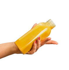 Women hand holding yellow smoothie of juice bottle, isolated