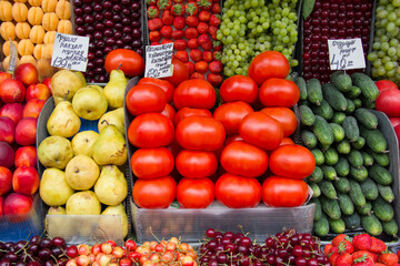 Pears, cucumbers, tomatoes and berries on the market