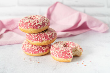 pink donuts, sweet dessert on a light background