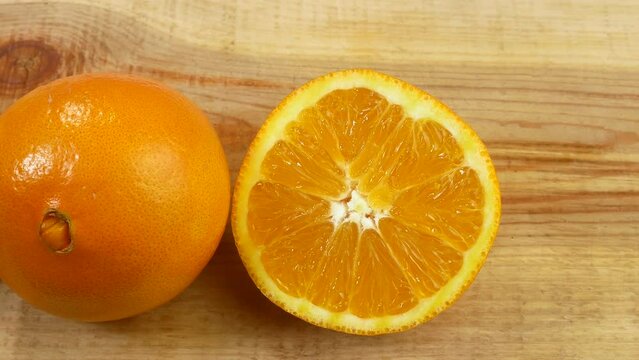 Many fresh fruits lie on the table. Beautiful lemons for healthy eating. Citruses lie beautifully on a white table.