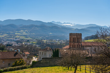 Cathedral of Saint Lizier and panorama of the Pyrenees, in Saint Lizier, in Ariège, in Occitanie, France