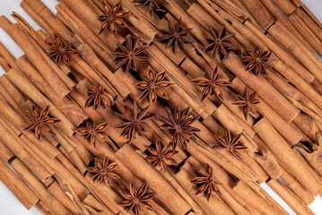 A lot of star anise on cinnamon rolls top view
