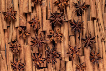 A lot of star anise on cinnamon rolls top view