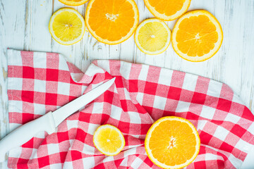 oranges, fruit cut, a colored towel