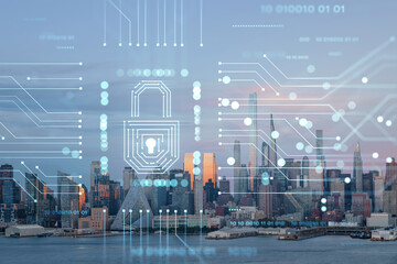 New York City skyline from New Jersey over Hudson River, Midtown Manhattan skyscrapers at sunset, USA. The concept of cyber security to protect confidential information, padlock hologram