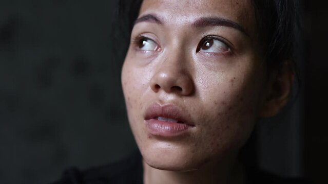 Unhappy woman thinking about problems depression Family problems, anxiety, mental health problems Suicide. Mayhem. Sexual abuse. Violence against women. 4K slow motion