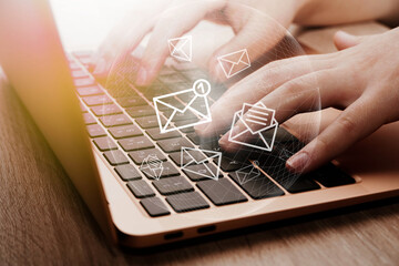  Person receiving and reading e-mail message on computer. Sending e-mails concept.