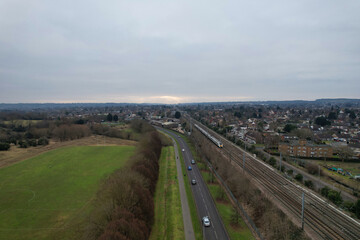 Fototapeta na wymiar Aerial View of Train on Tracks at Leagrave Railway Station of Luton England UK