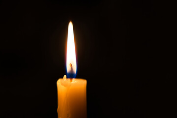 1 candle light in the dark