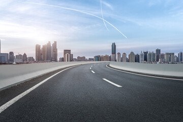 Naklejka premium Road ground and urban landscape
