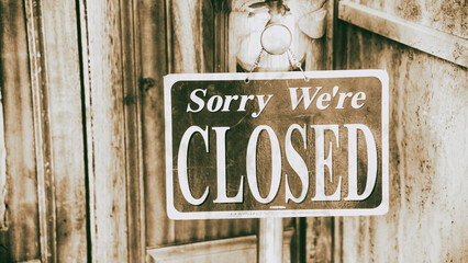 Sorry we're closed entrance sign