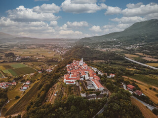 Small medieval town on the hill top in vintage colors.