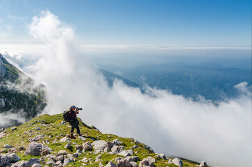 Travel photographer takes scenic photos of Soca valley in Slovenia from the Krn mountain