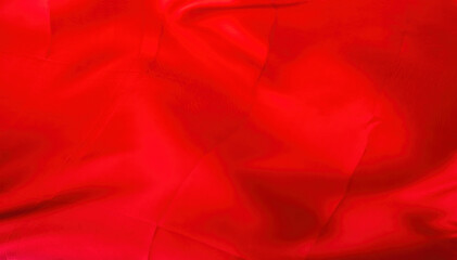 Background of a red waving velvety cloth. A flag is waving in the wind.