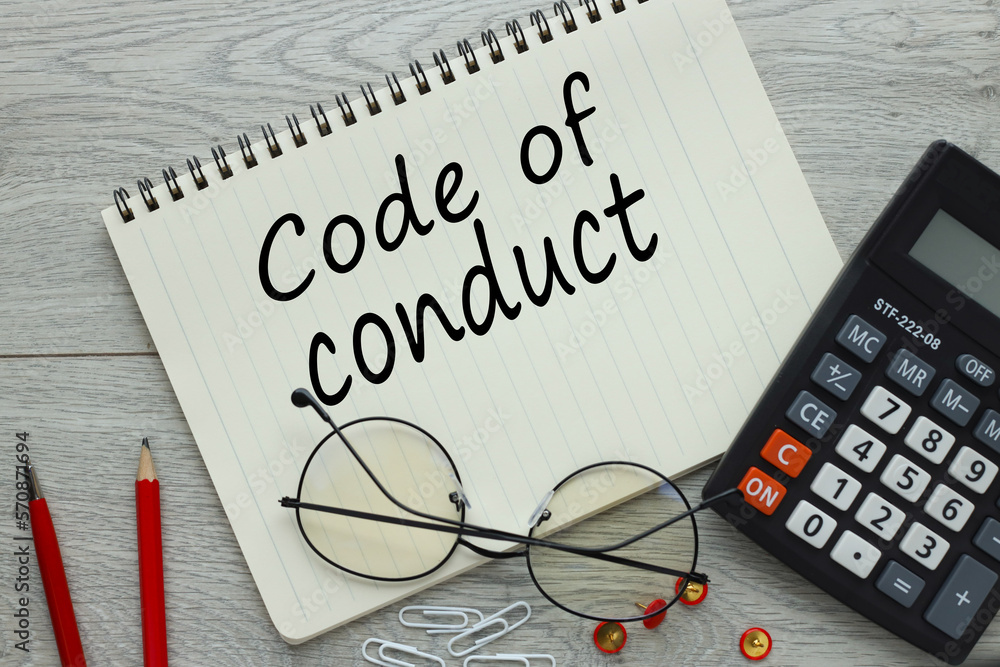 Poster code of conduct symbol. red pencils and glasses near notepad with text
