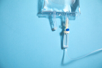  Infusion bag in the blue background. IV drip chamber