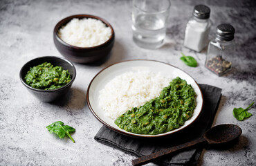 Spinach dahl with rice in a plate