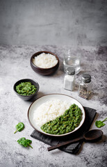 Spinach dahl with rice in a plate