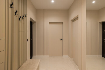 Fototapeta na wymiar Interior of a corridor in a modern apartment in a new building