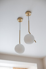 Layers of light bulbs in a modern interior of a new apartment